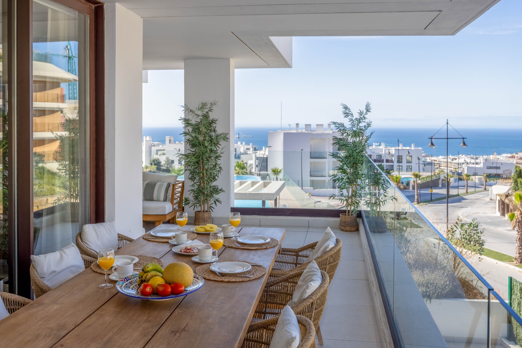 Breakfast table on the terrace overlooking the Mediterranean