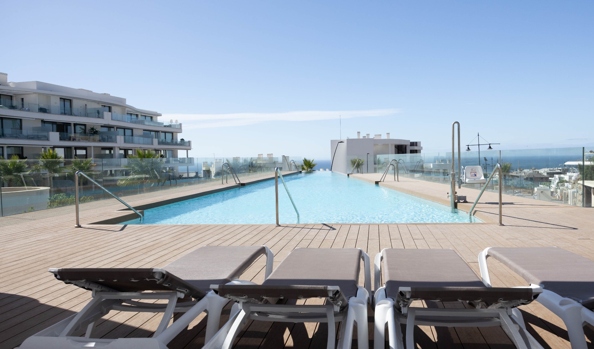 Shared pool overlooking the sea